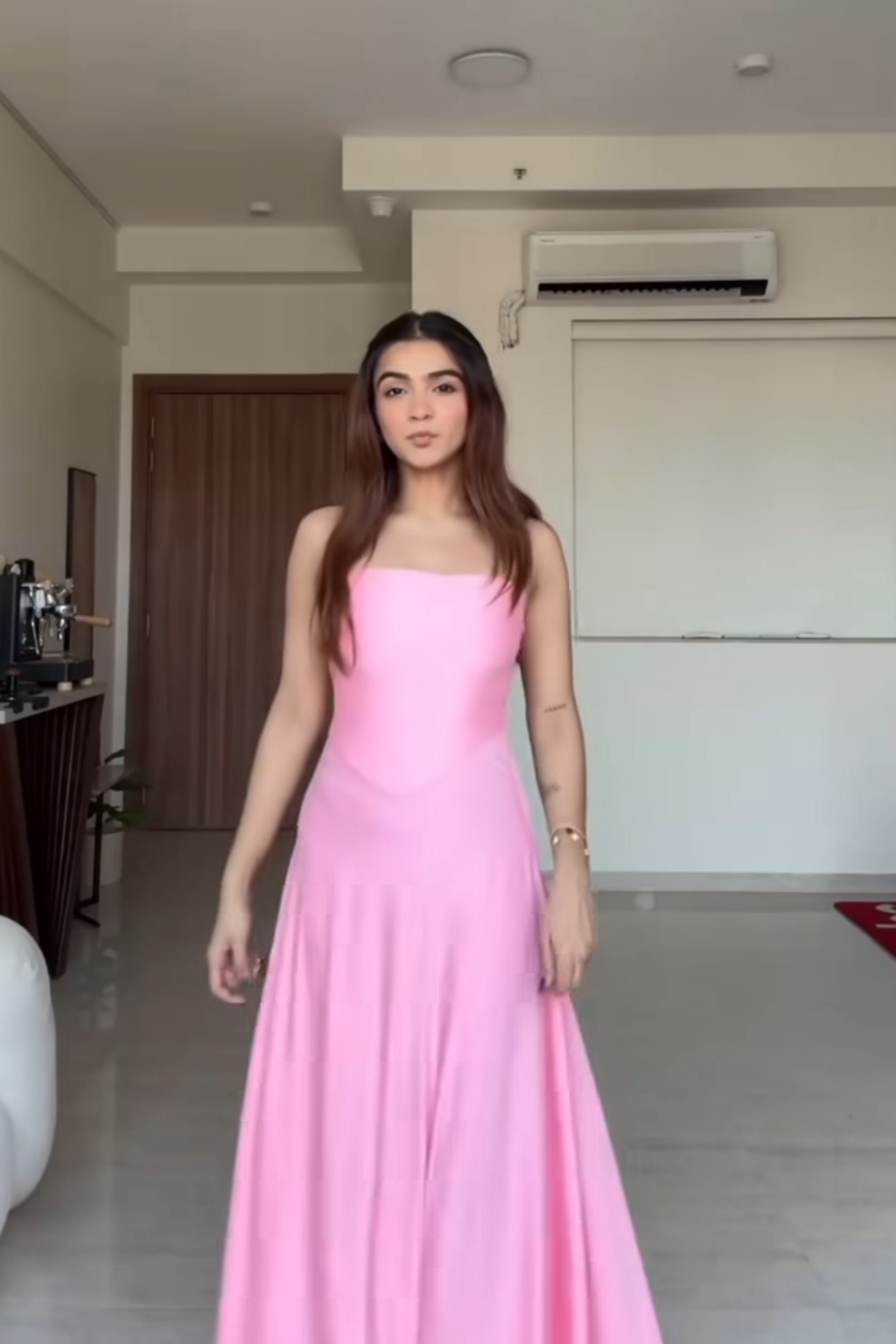 Apoorva in flow dress flamingo