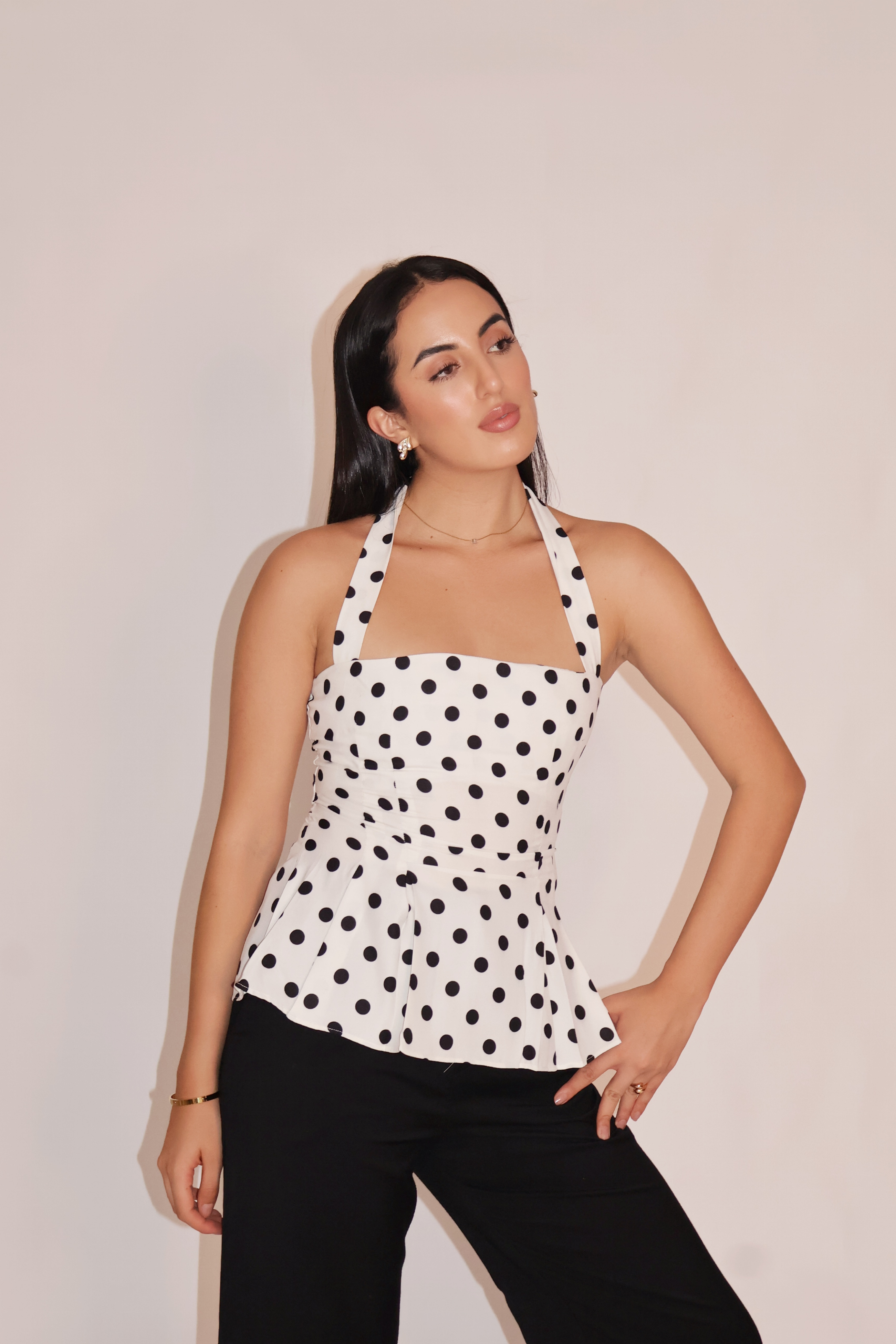 Saakshi in ivy top white
