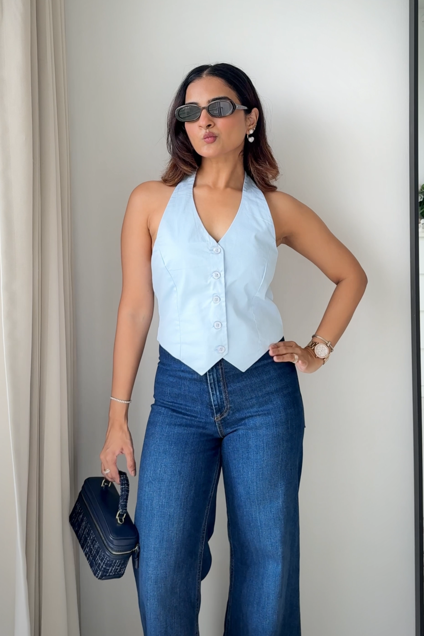 Naina in elan waistcoat sky