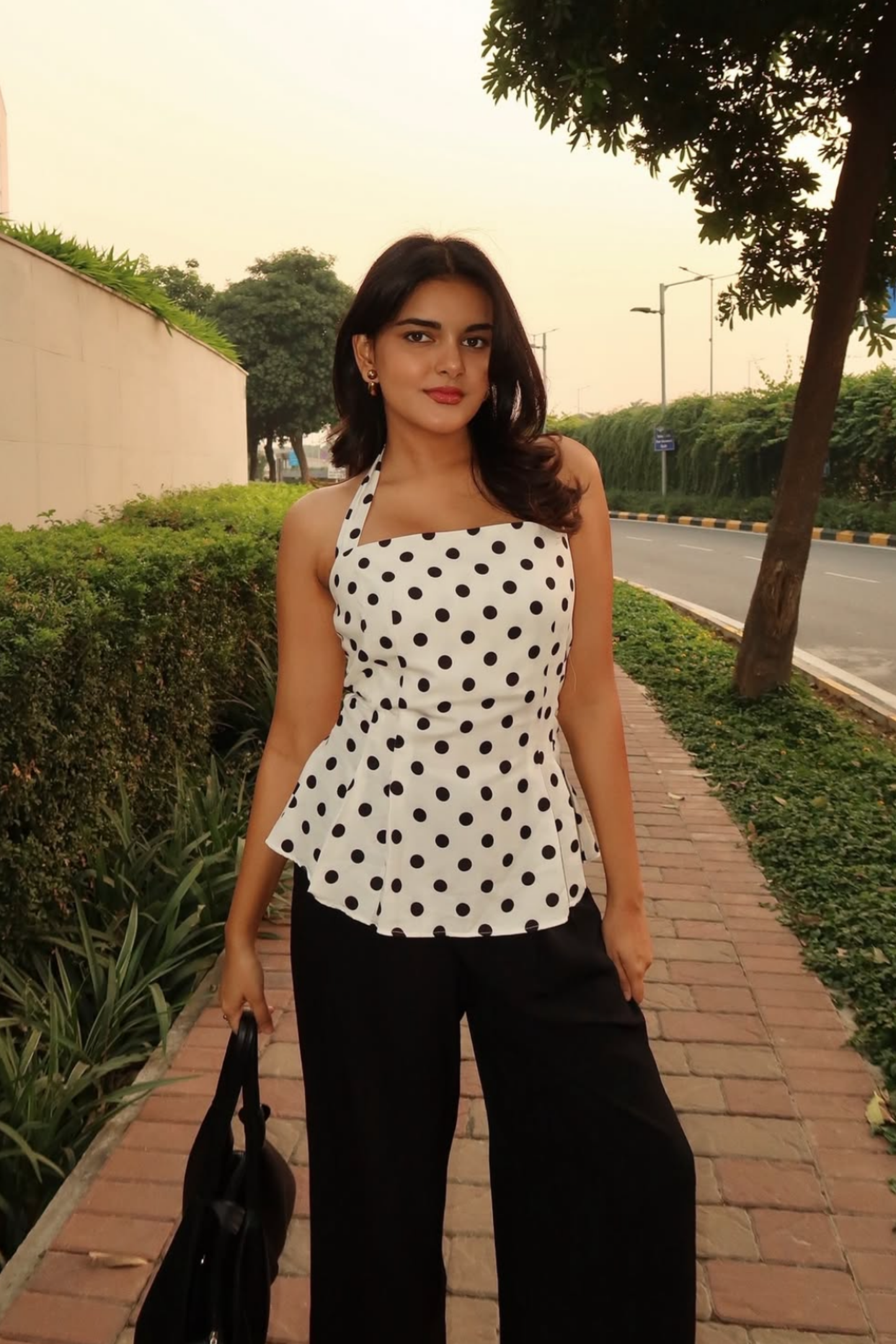 Saakshi in ivy top white